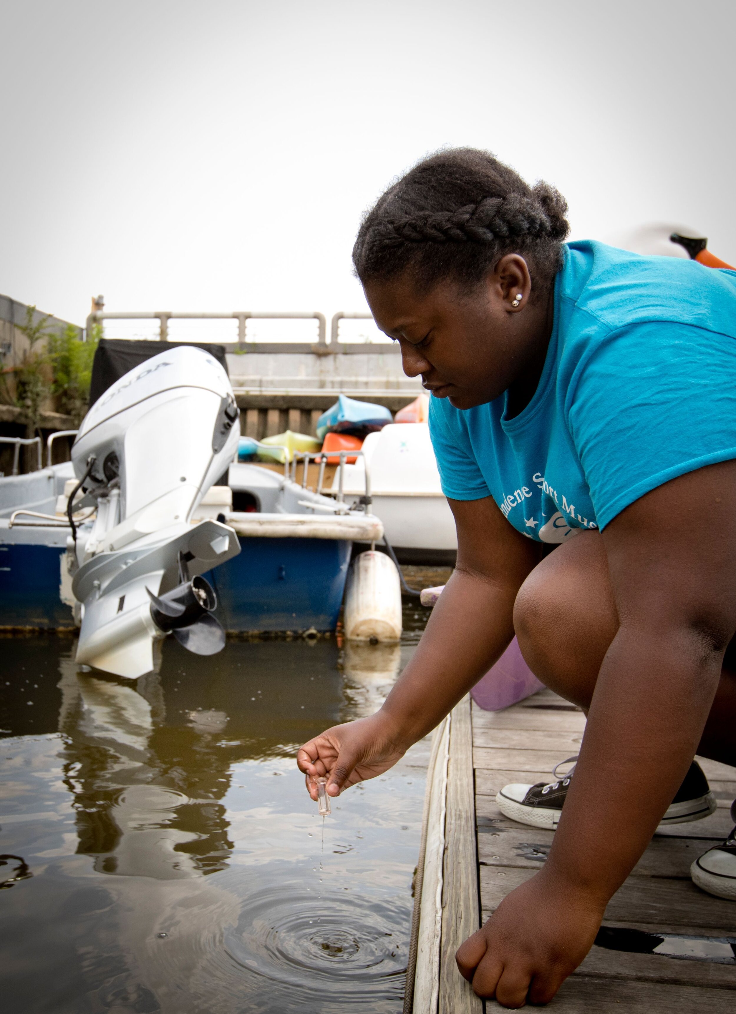 A student in the River Ambassador program pulls a water sample from the Delaware. Photographs courtesy of Independence Seaport Museum