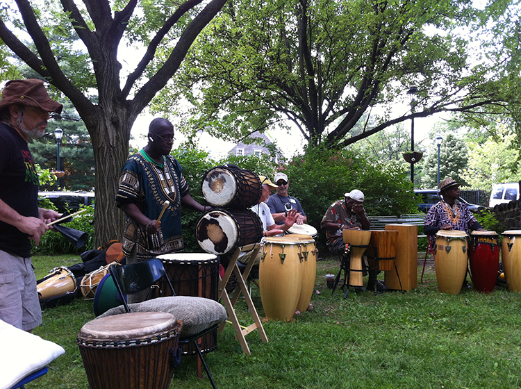 An outdoor community drum circle in Mount Airy. Photography courtesy of Peggy Tileston.