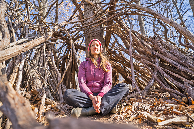 Forest therapy guide Anisa George takes in nature. Photography by Drew Dennis.