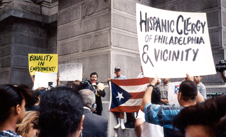 The Hispanic Clergy of Philadelphia protests for jobs outside City Hall.