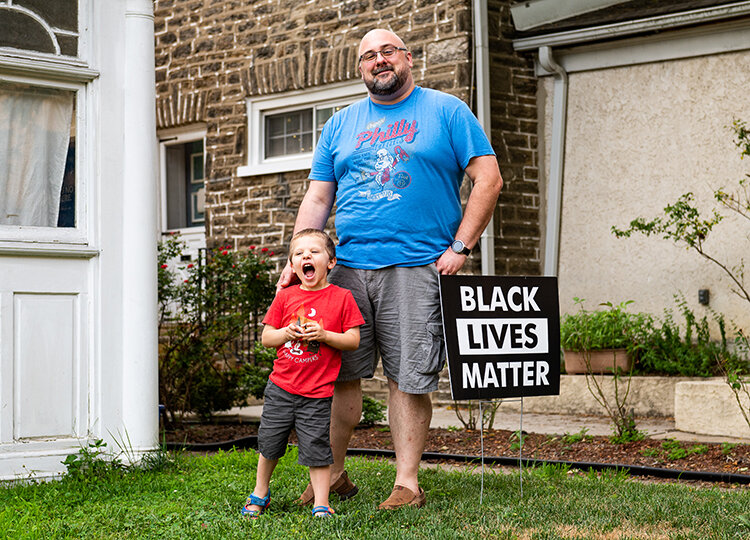 Mike Finnell teaches his son Wesley about anti-racism and white privilege. Photography by Chris Baker Evens.