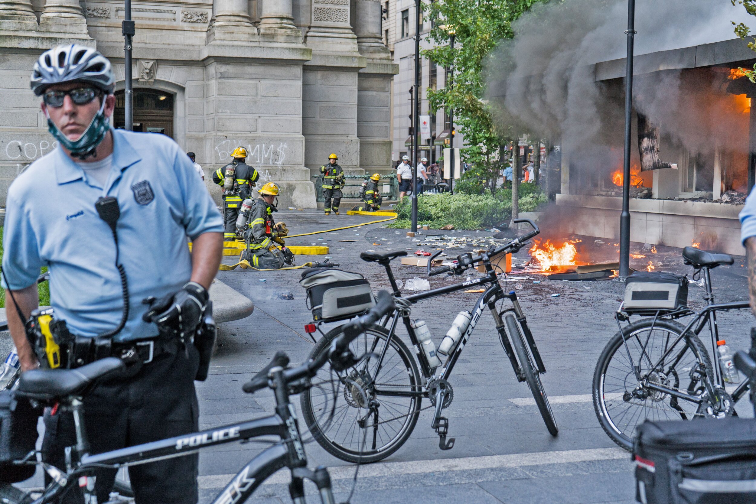 Police and firefighters by in center city Philadelphia during the George Floyd protests in May.