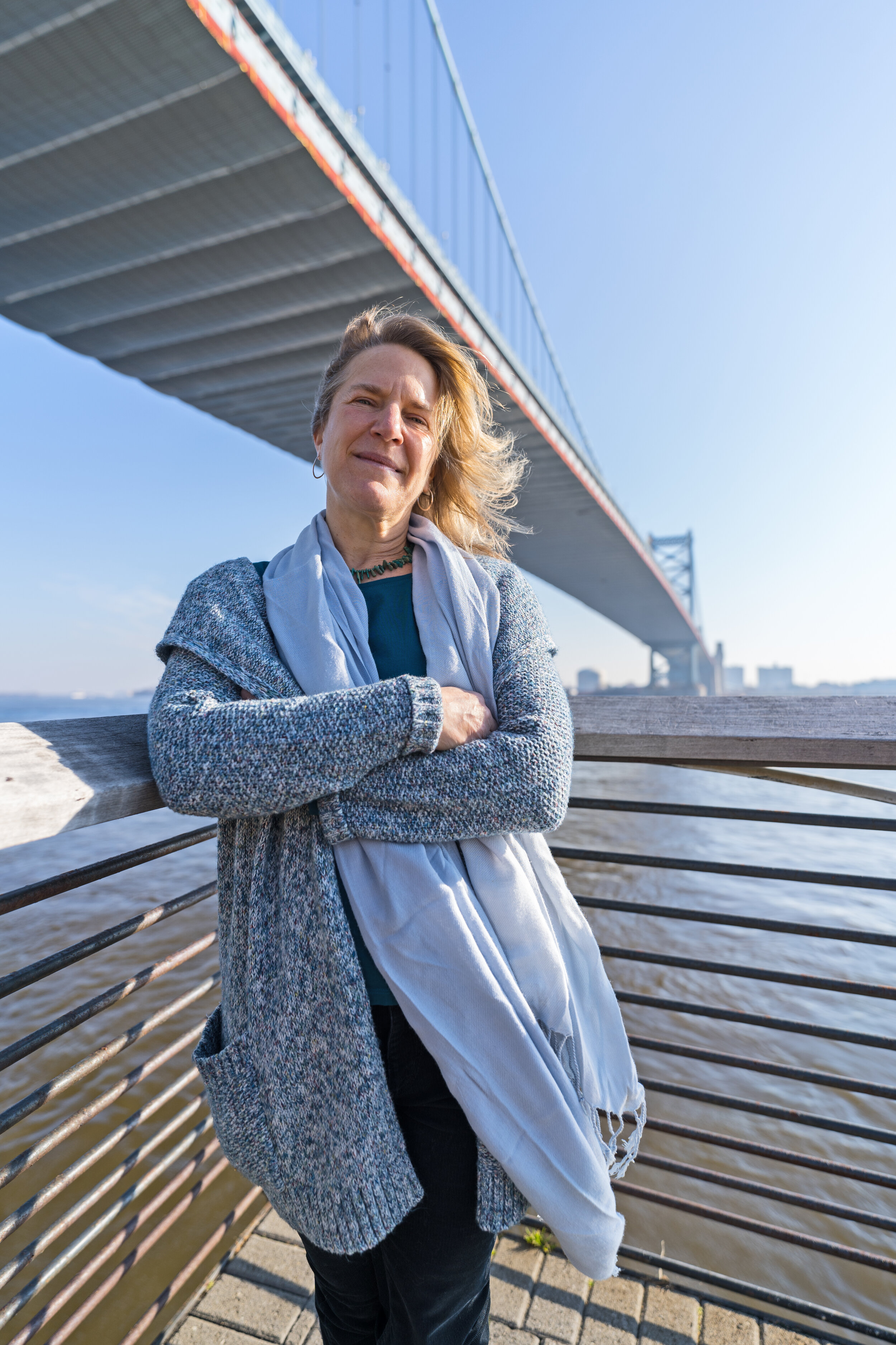 Delaware Riverkeeper Maya van Rossum stands beside the Delaware River.&nbsp; She has been a watershed advocate for over 25 years.Photography by Drew Dennis.
