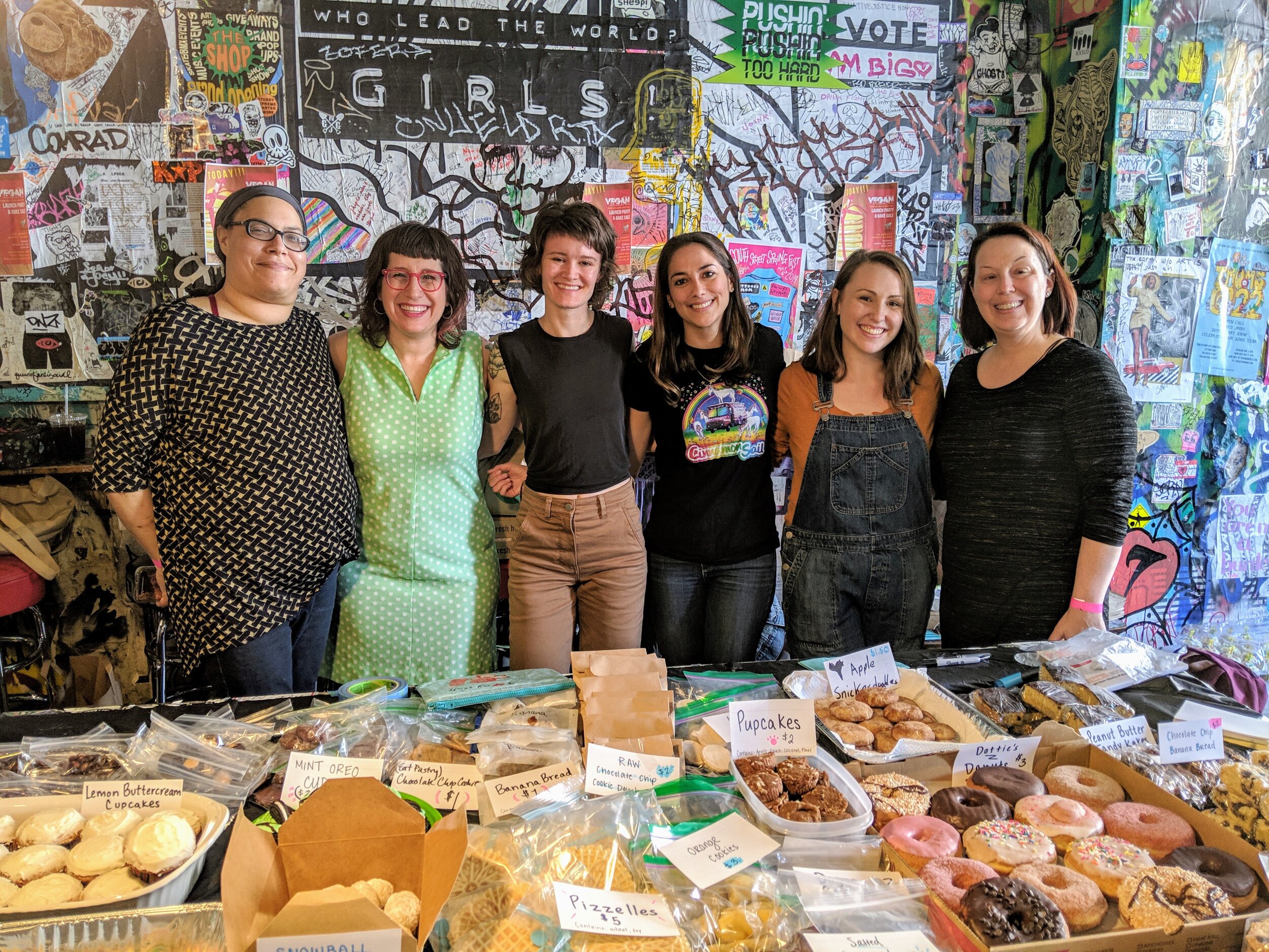 Organizers of Philly Vegan Restaurant Week pictured at one of the fundraiser bake sales at Tattooed Mom. Photographs courtesy of Philly Vegan Restaurant Week organizers.
