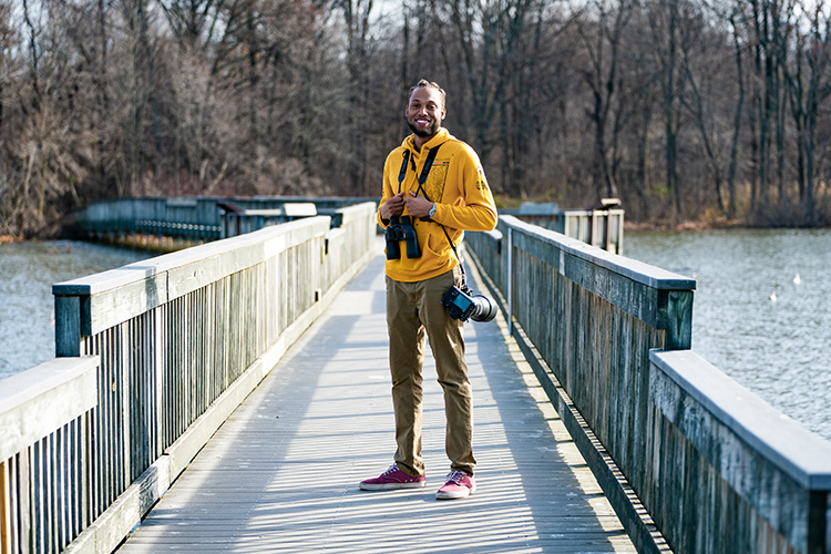 Man standing on boardwalk