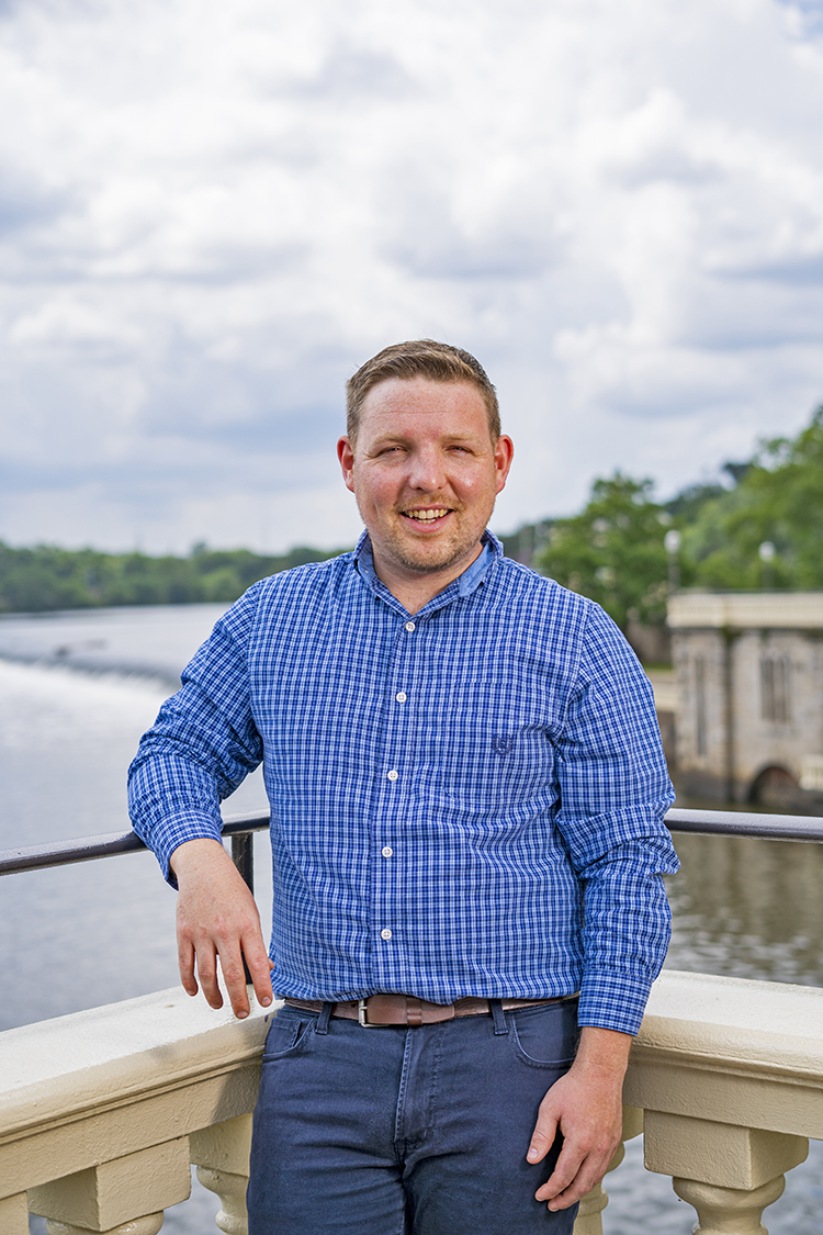 Josh Lippert, the City of Philadelphia’s floodplain manager, in front of the Fairmount Dam at the Fairmount Water Works. Photograph by Drew Dennis.