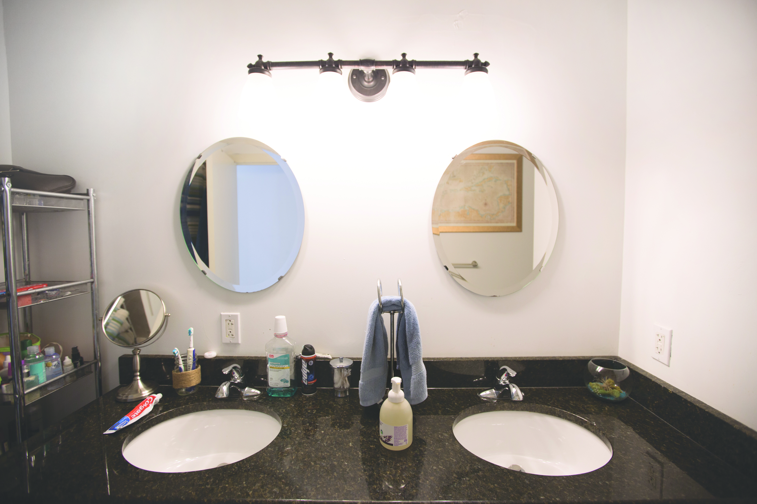 The shared bathroom space of Art Museum resident Krista Pfleger. Krista's sink is on the right.