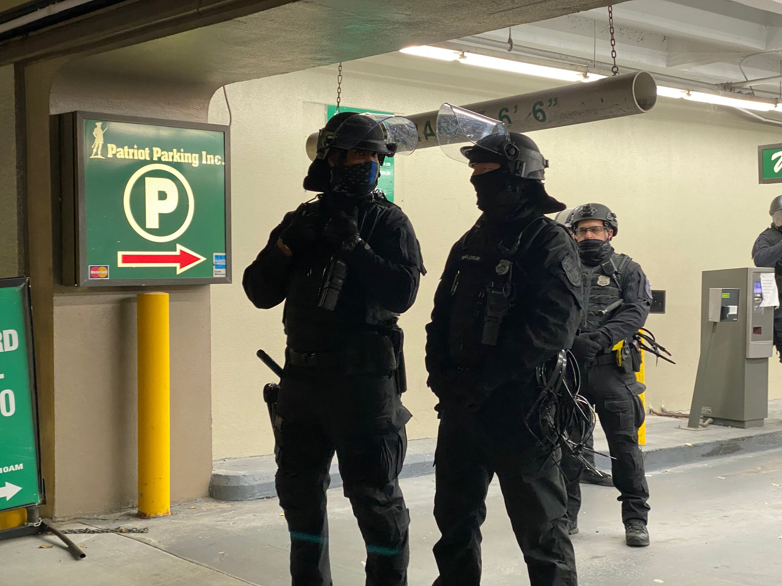 Counter-terrorism police in the parking garage next to the Holiday Inn.