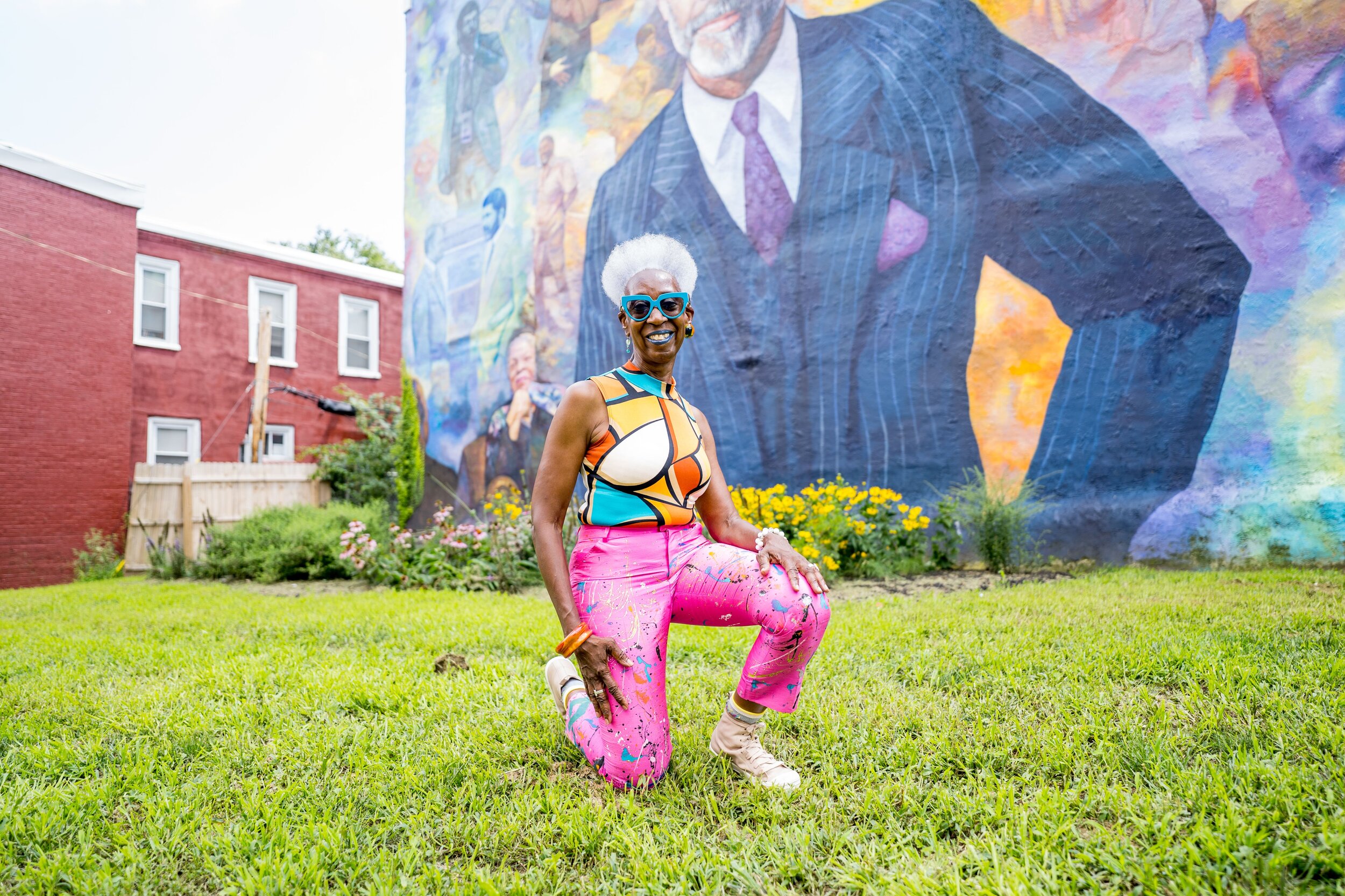 An example of a lot-turned pollinator garden and mural site at Wyalusing street and Belmont Avenue in West Philadelphia from the September issue of Grid. Read the story here.Photograph by Drew Dennis. Pictured: Sandra Calhoun.