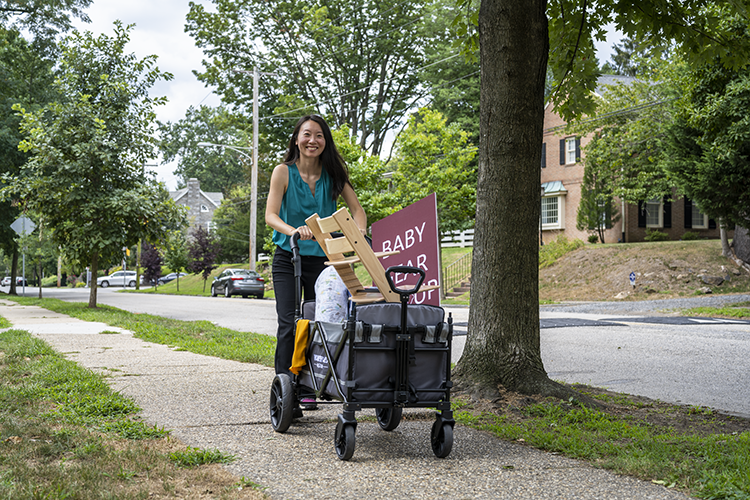 Bo Zhao, founder of Baby Gear Group, pushes a stroller filled with items the company offers.