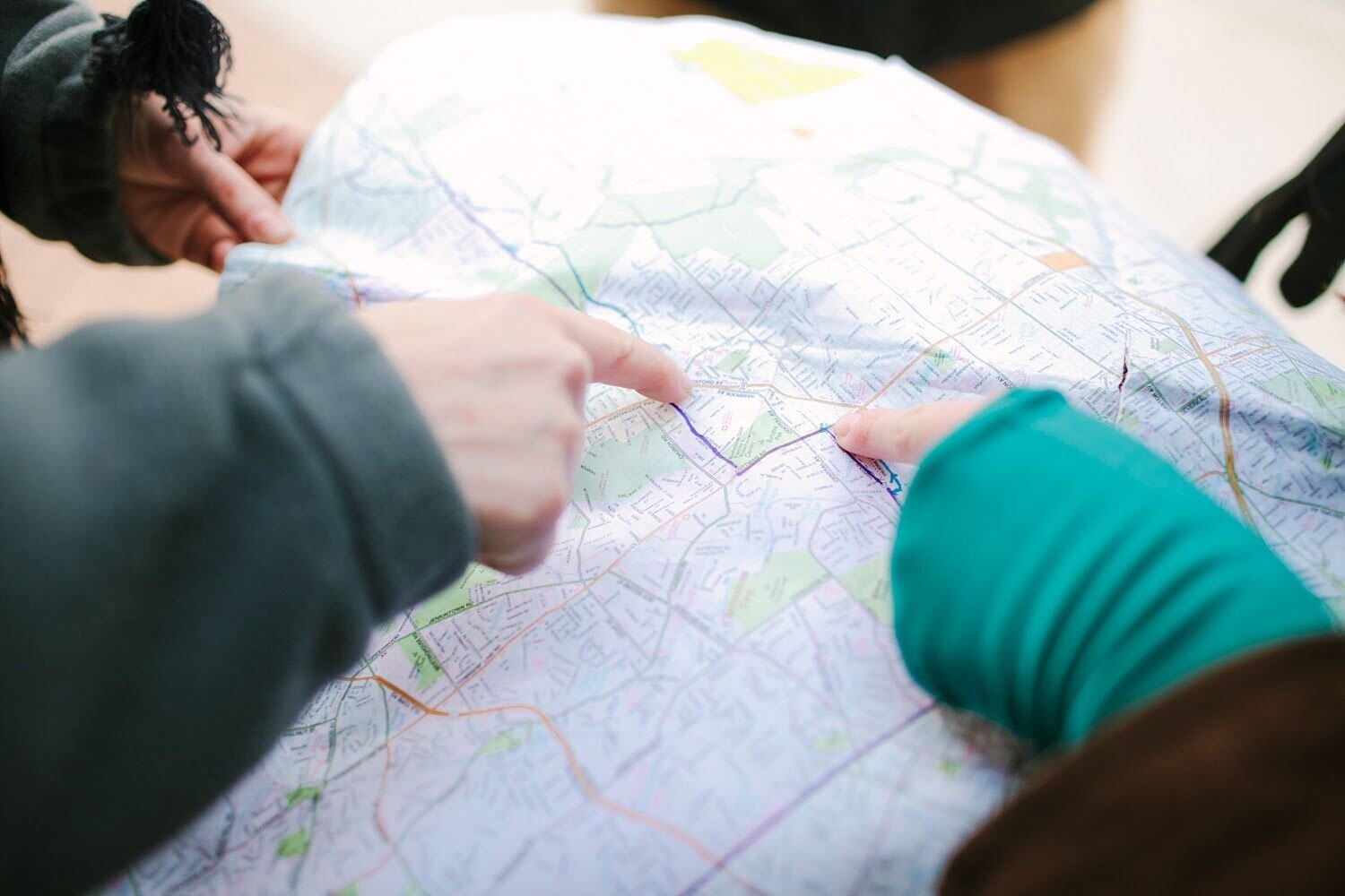Hikers map out their route.