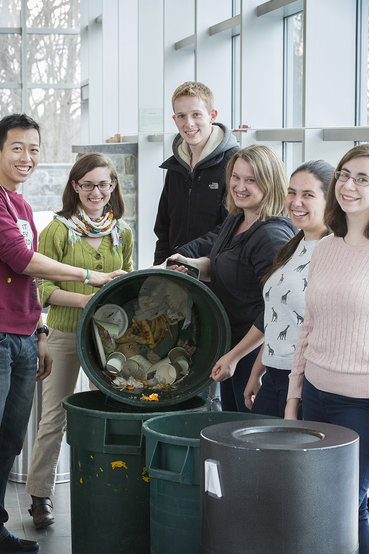  Melissa Tier, Sustainability Program Manager (2nd from left) and Aurora Winslade, Director of Sustainability (4th from left) sort compost at Swarthmore College, which composts organic waste in all dorms and office buildings. (Photo courtesy of Swart