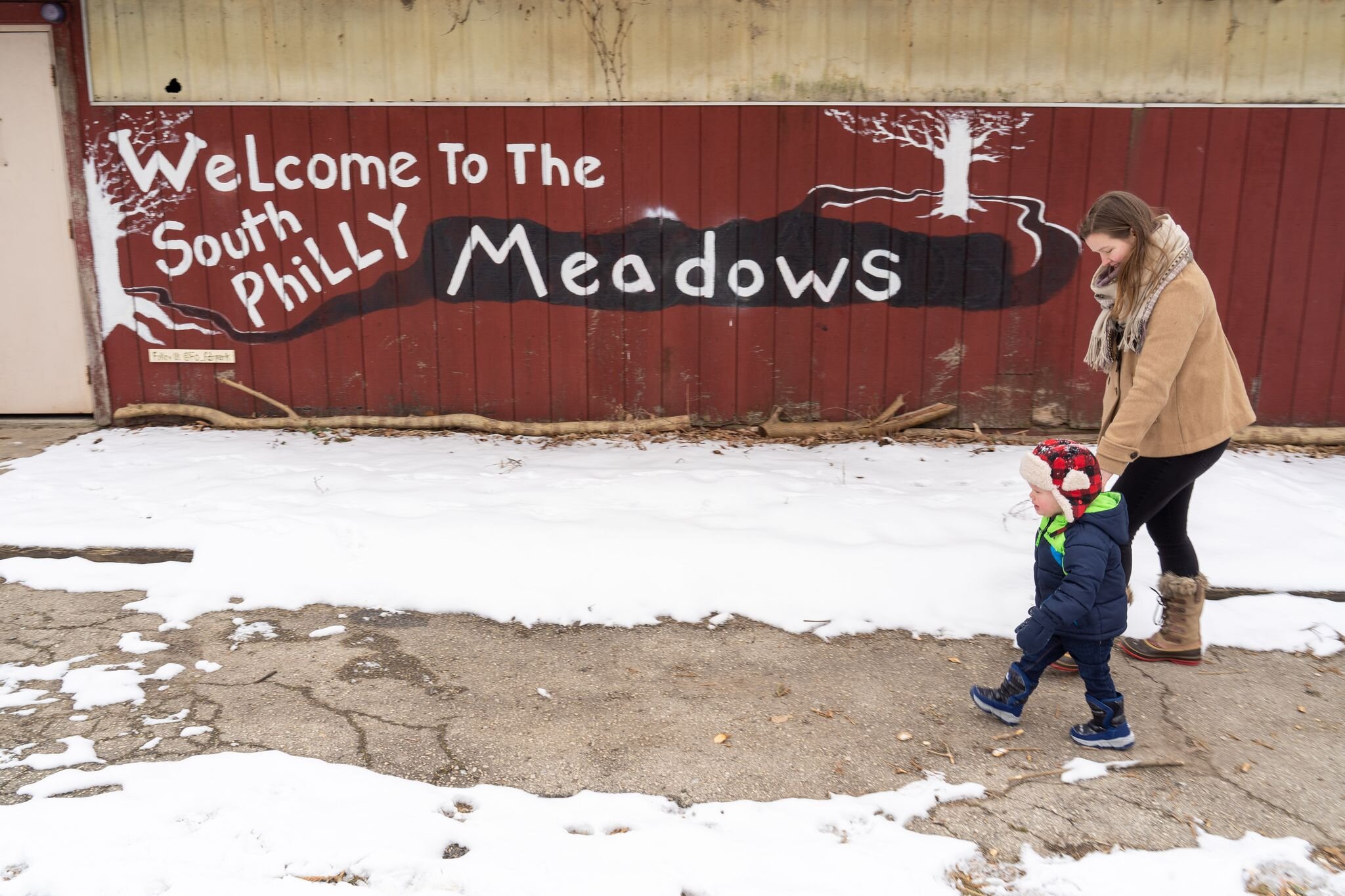 Debra Lytle and her toddler, Teddy, enjoy FDR Park on a snowy day. Photography by Milton Lindsay.