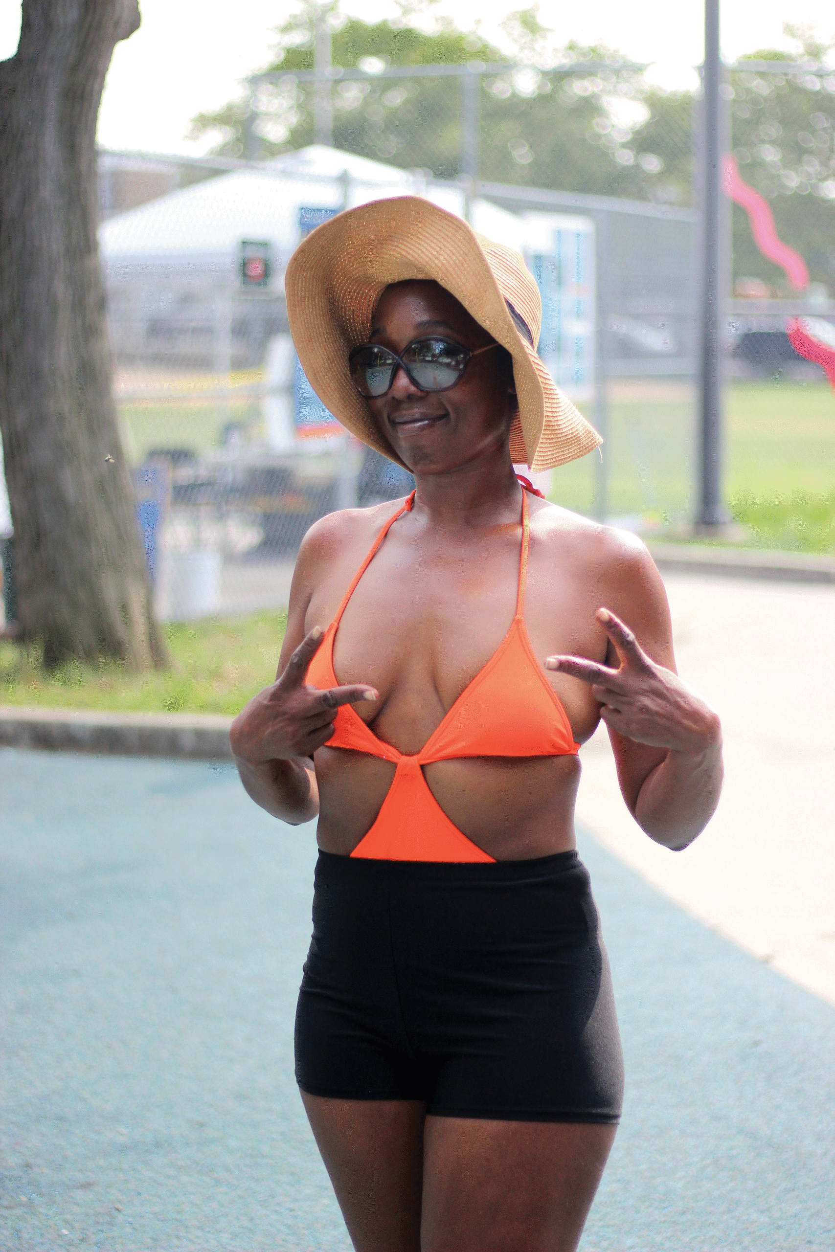 Sharona Smith has brought her family to the pool for the first time today, and as a traveling nurse, she’s well-versed in the best strategies for staying safe and healthy in the heat. “Everyone just needs to stay hydrated and stay out of the direct sun and use sunscreen,” she says. 
