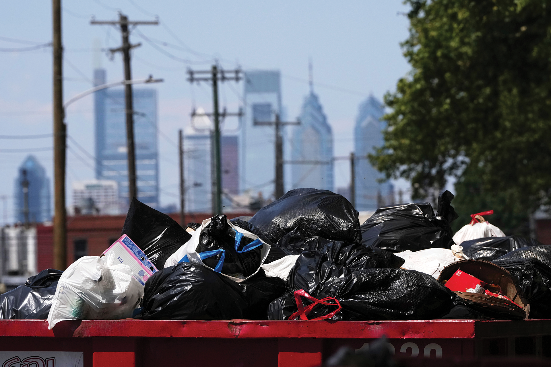 Trash piles up at a garbage collection site in July. 